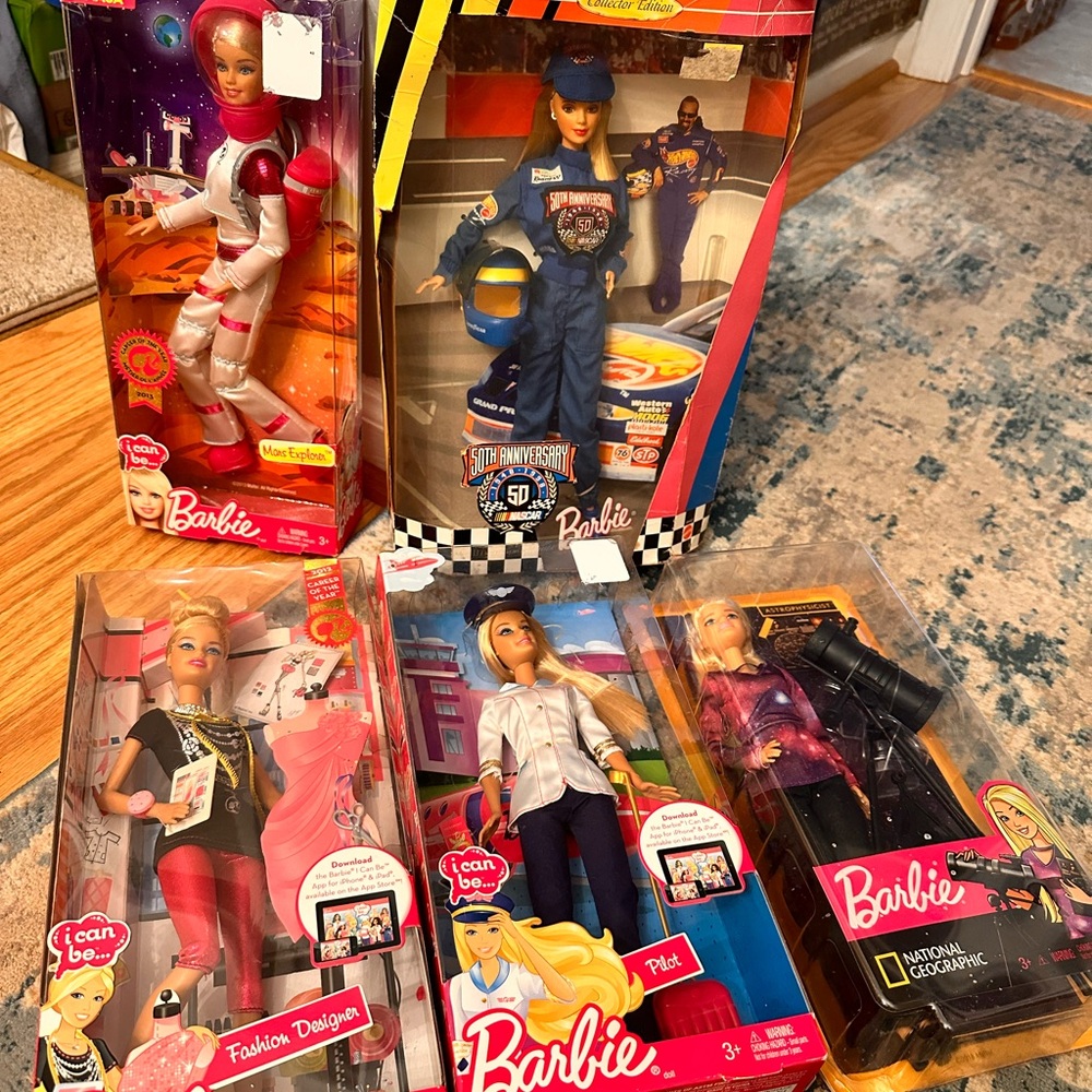 Selling 5 different Barbie dolls!
